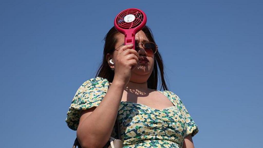 woman with fan