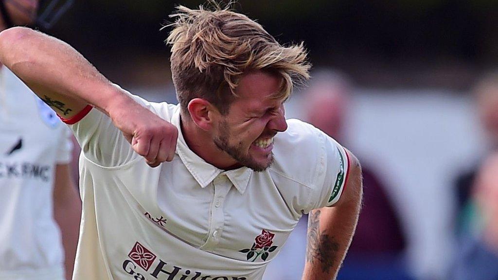 Lancashire's Tom Bailey celebrates a wicket