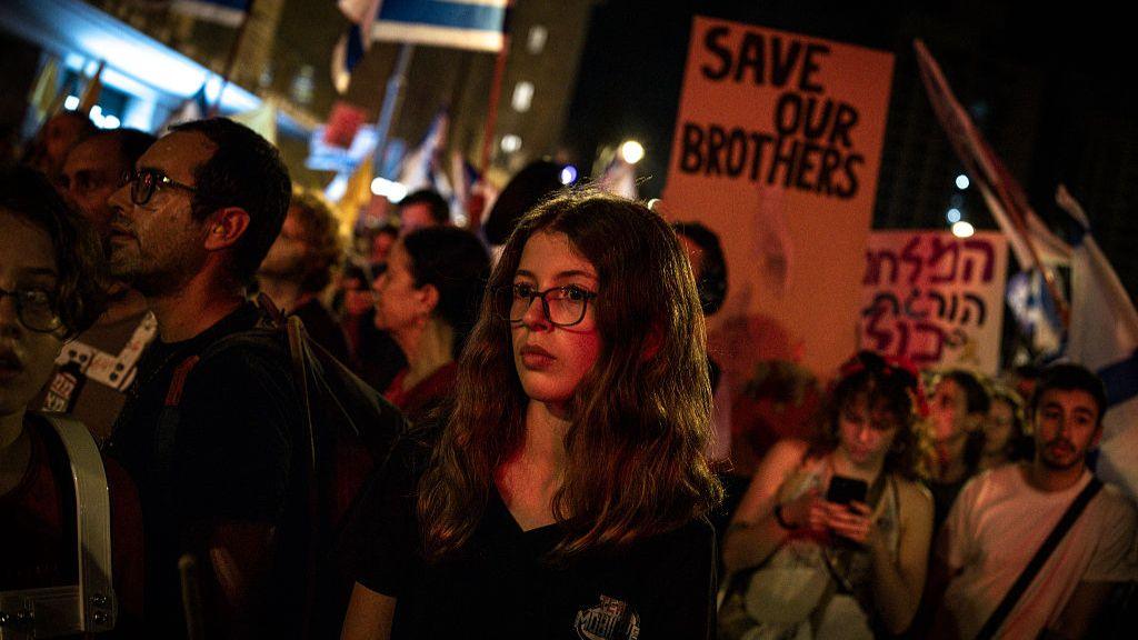 A woman attends a demonstration in Jerusalem organised by the families of the Israeli hostages in Gaza.