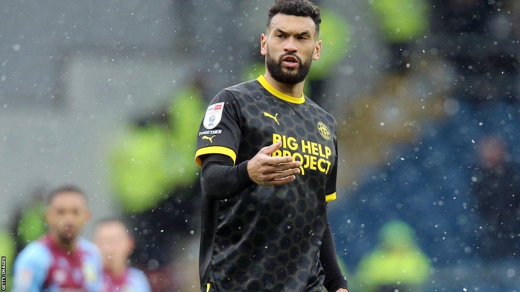 Steven Caulker playing for Wigan