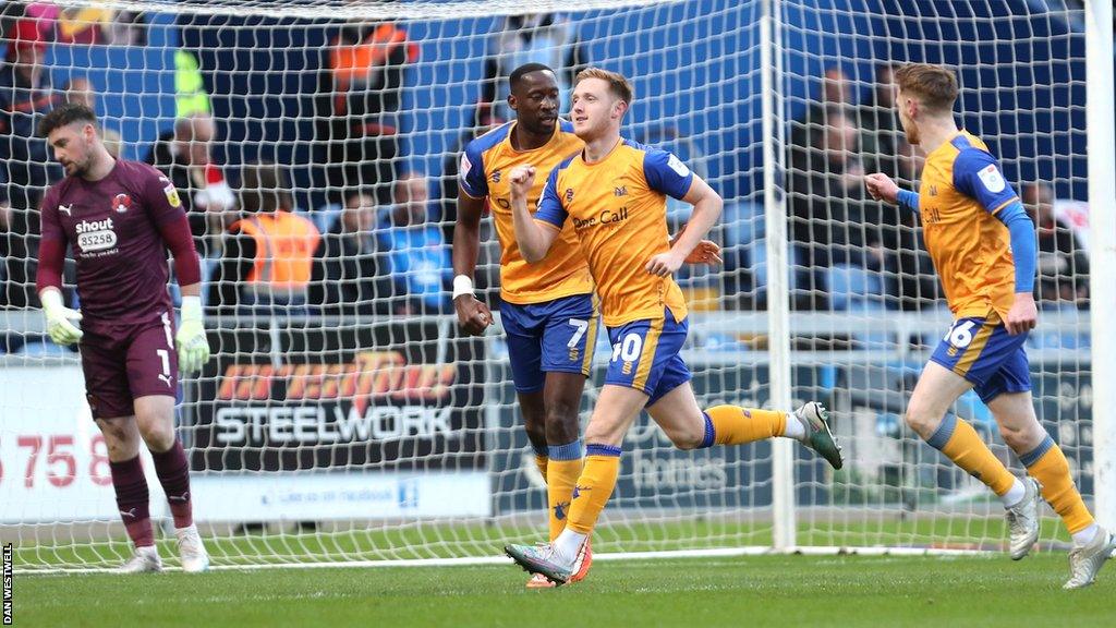 Davis Keillor-Dunn celebrating the goal that put Mansfield ahead against Leyton Orient