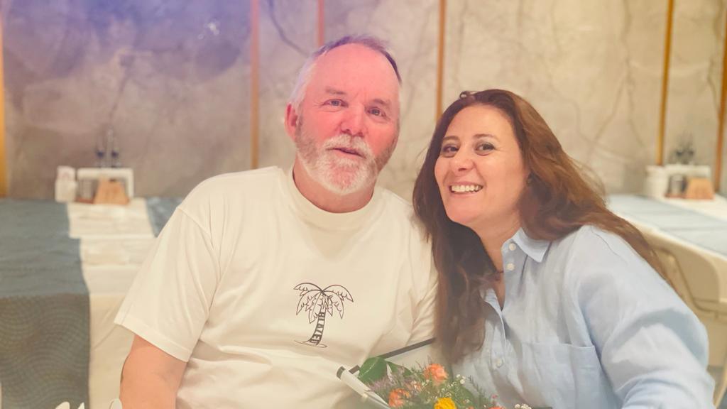 William McCulloch and Nadia Ayoub McCulloch, smiling at the camera