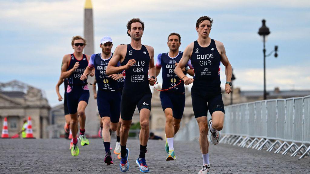 Dave Ellis (left), with guide Luke Pollard, is a leading British medal hope in the Paris 2024 para-triathlon