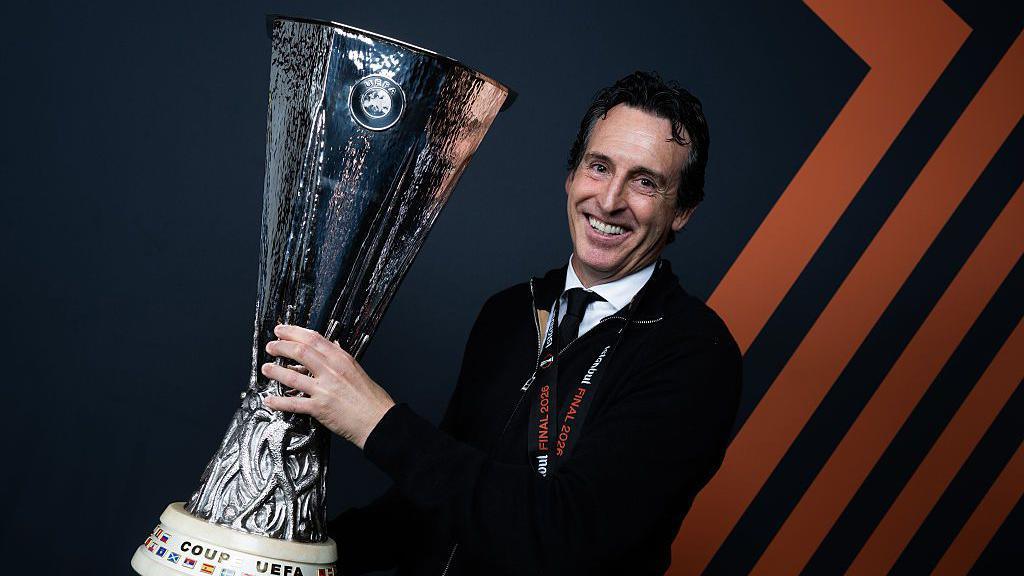 Unai Emery with the Europa League trophy