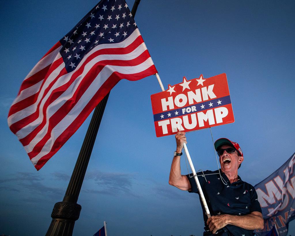 Trump supporters outside the Mar-a-Lago Club where he announced his third run at the US presidency