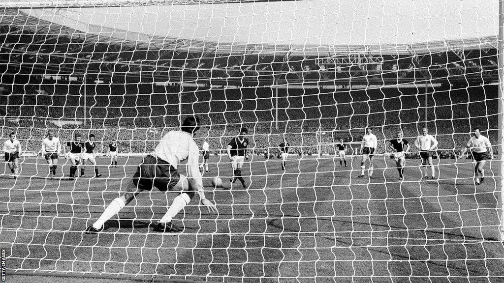 Jim Baxter scores a penalty for Scotland against England in 1963