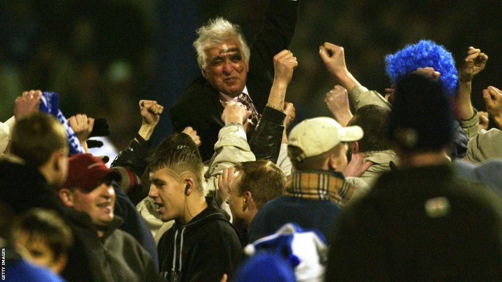 Sam Hammam celebrates with Cardiff fans