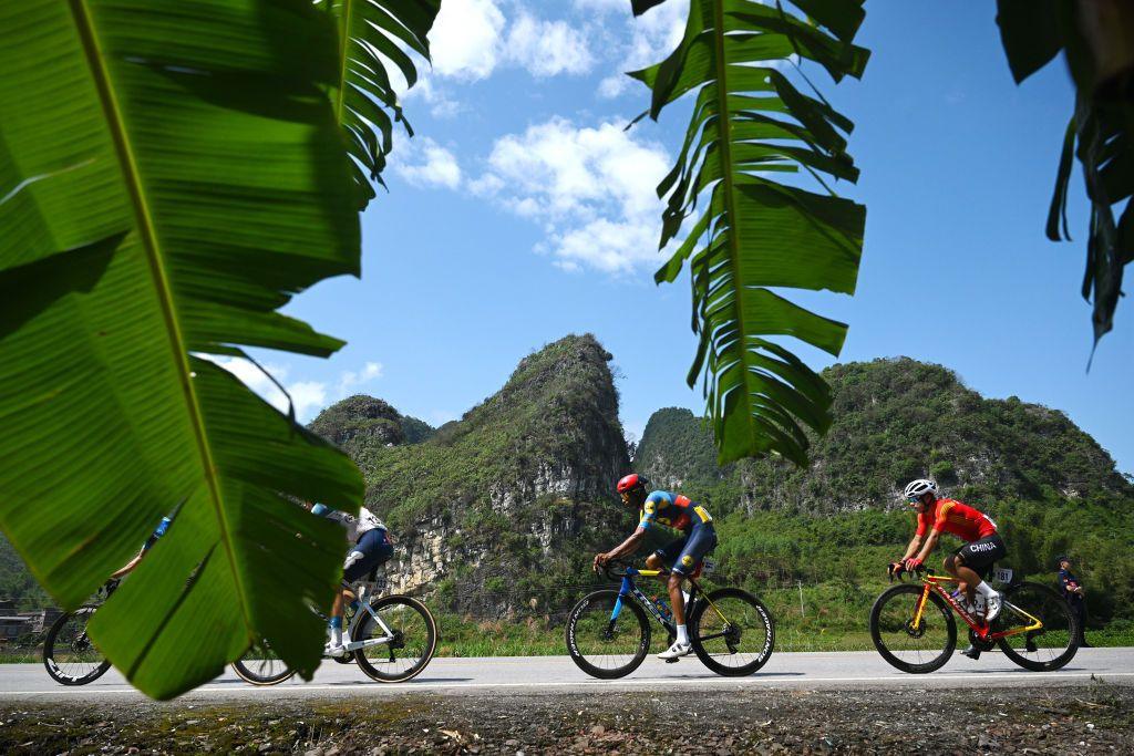 Amanuel Ghebreigzabhier of Eritrea and Team Lidl - Trek, Xianjing Lyu of China and Team China and a general view of the peloton competing during the 5th Gree-Tour Of Guangxi 2024, Stage 5 a 165.8km stage from Yizhou to Nongla 641m.