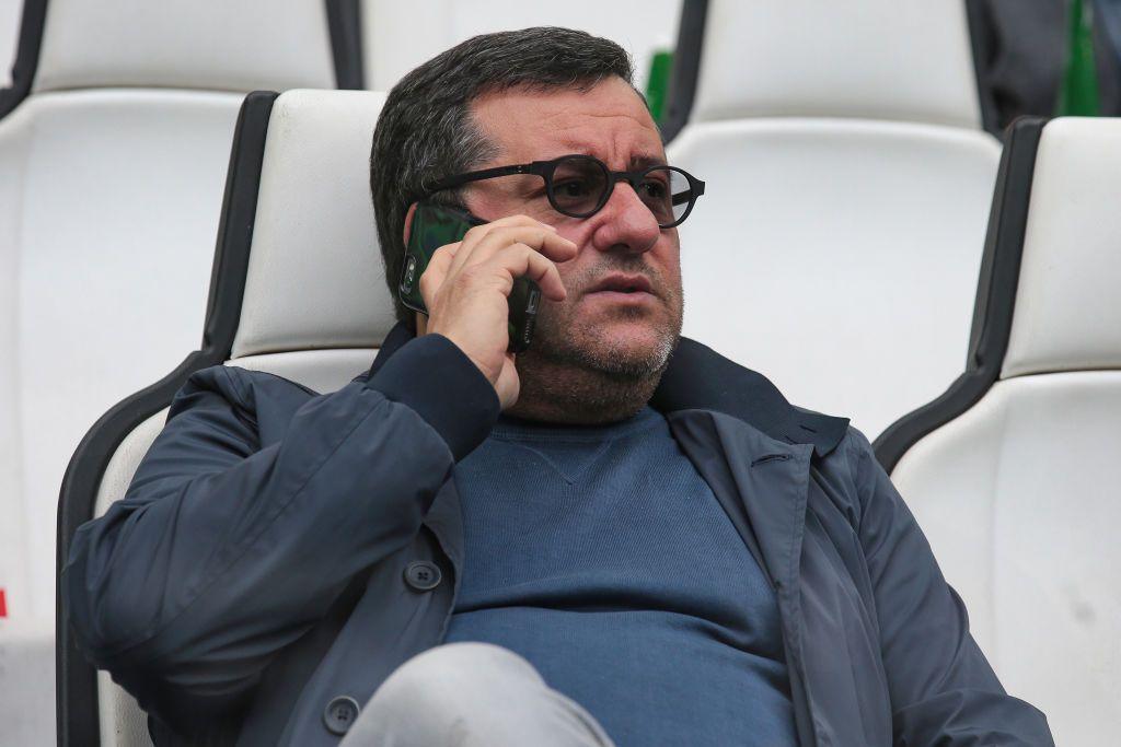 Mino Raiola takes a phone call during the Serie A match between Juventus and Napoli