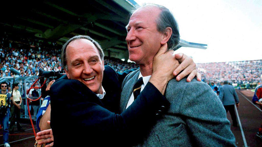 Republic of Ireland manager Jack Charlton (right) and assistant manager Maurice Setters celebrate at the final whistle