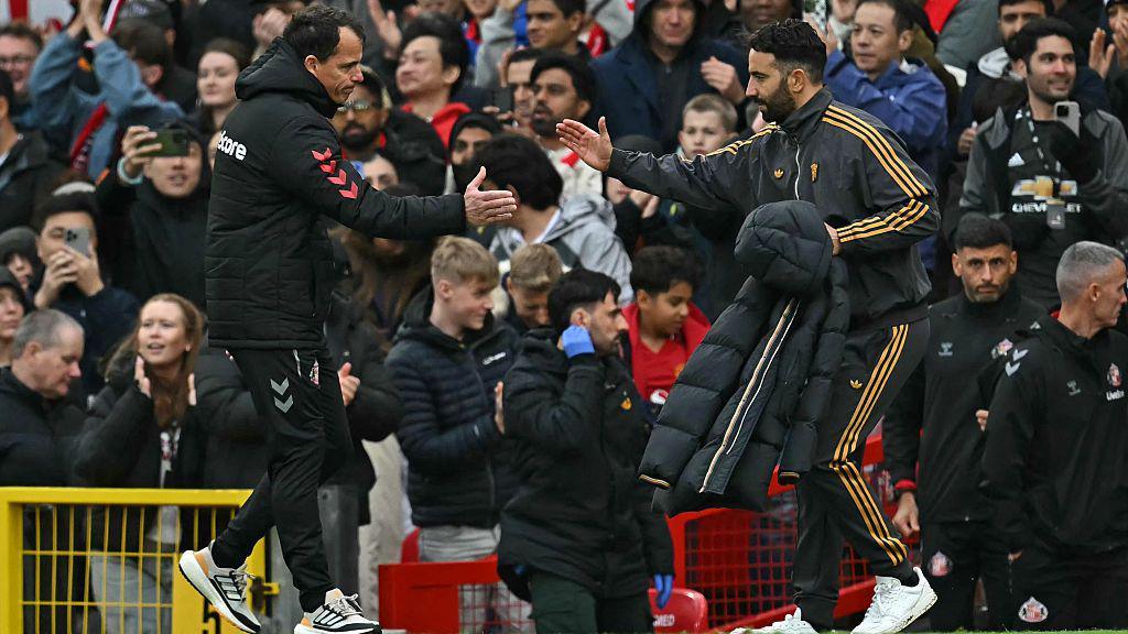 Ruben Amorim shakes hands with Regis Le Bris 