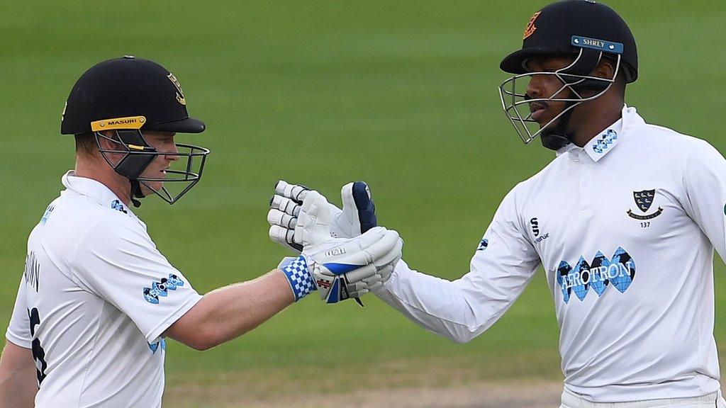 Ben Brown and Chris Jordan shake hands