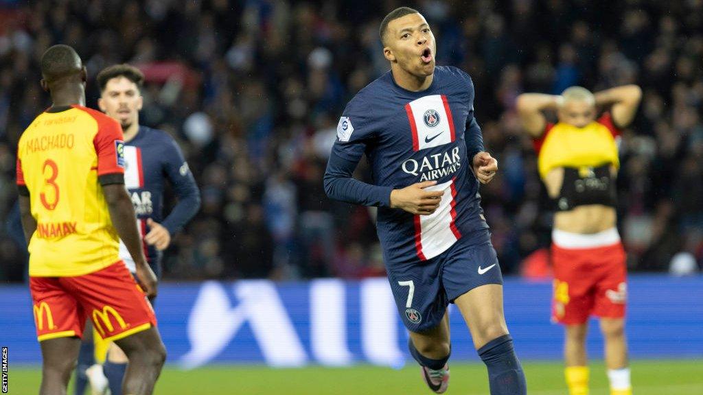 Kylian Mbappe celebrates scoring for Paris St-Germain against Lens in Ligue 1