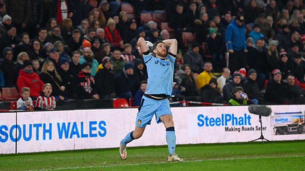 Ben Tozer throwing ball