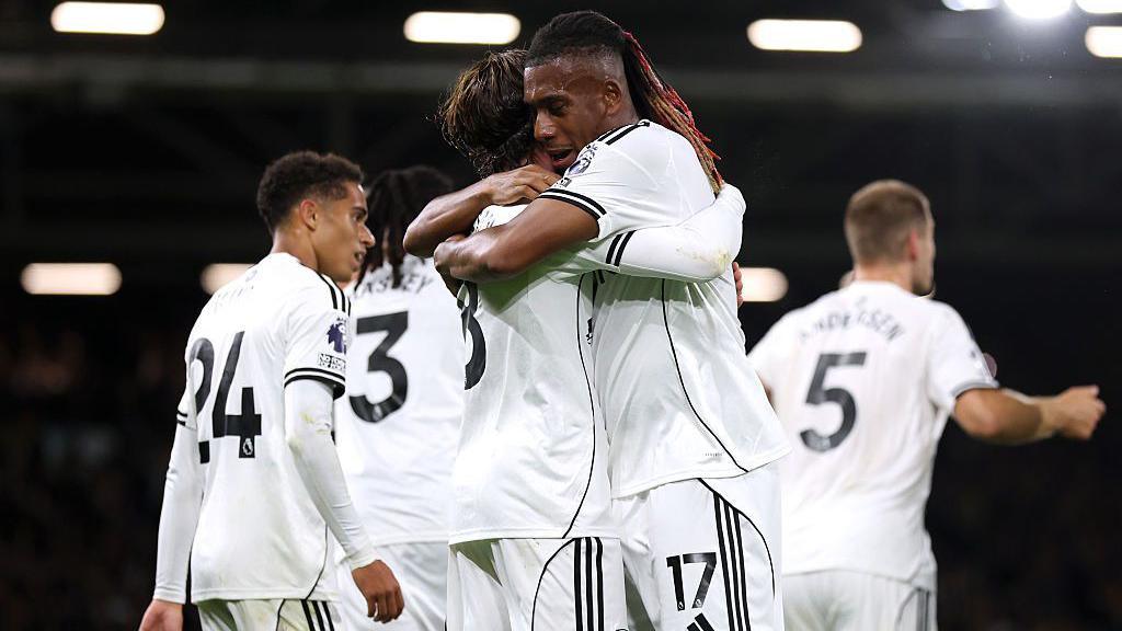 Fulham players Alex Iwobi and Harry Wilson celebrate