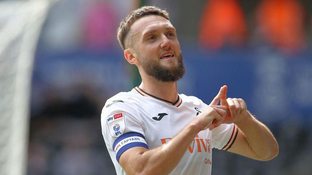 Matt Grimes celebrates a goal