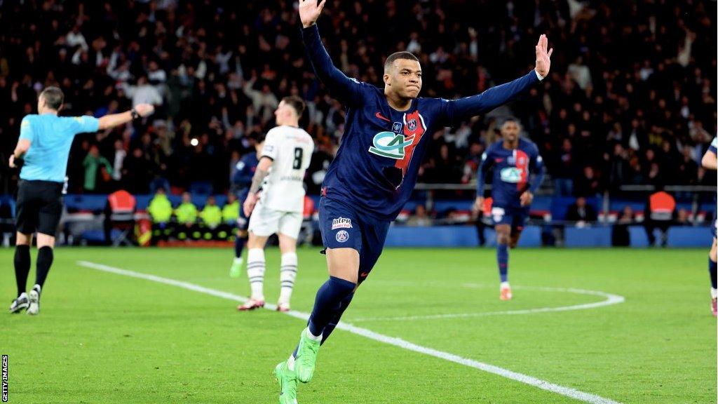 Kylian Mbappe celebrates scoring in the French Cup