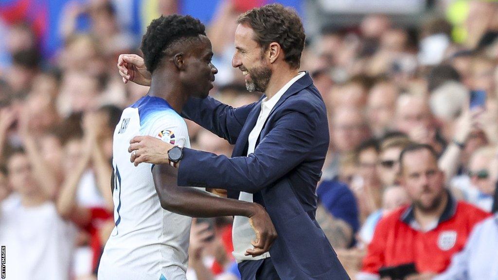 Bukayo Saka and Gareth Southgate