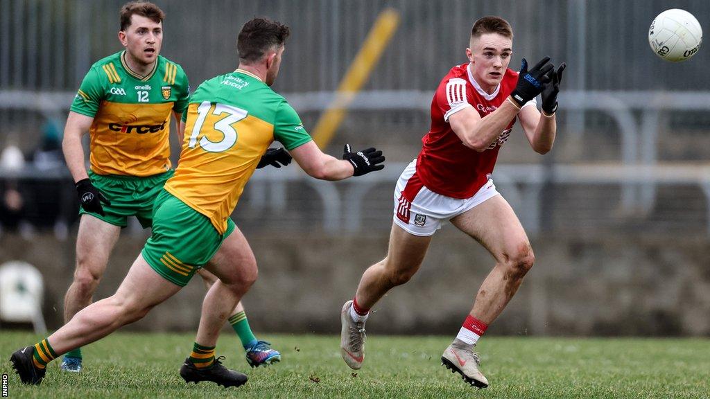 Patrick McBrearty attempts to block a pass from Cork pass in Ballybofey