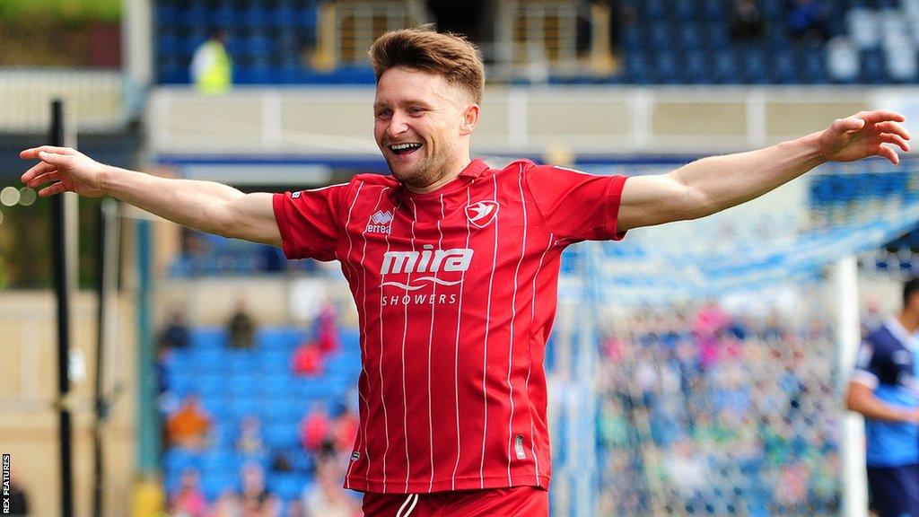 Alfie May in action for Cheltenham Town