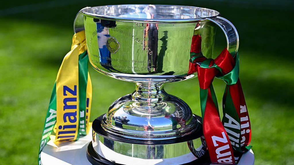 The National Football League trophy with Allianz ribbons attached