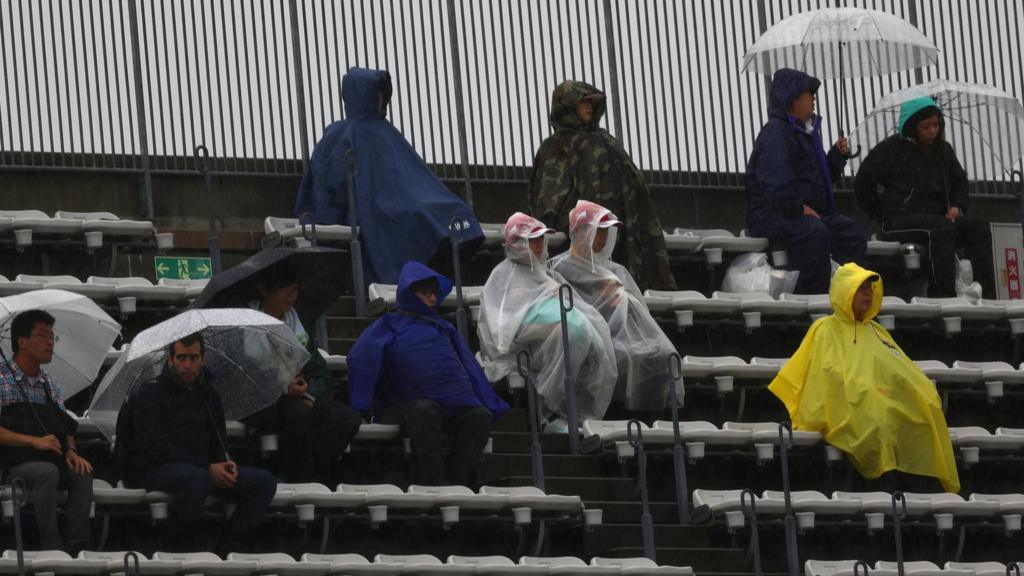 Japanese grand prix fans in the rain