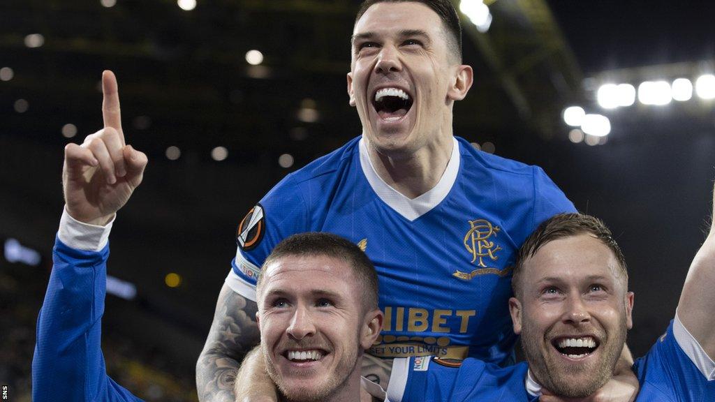 Ryan Jack, John Lundstram and Scott Arfield celebrate