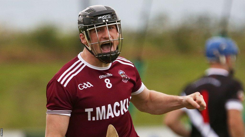 Rogers celebrates scoring one of his goals in the Derry hurling final