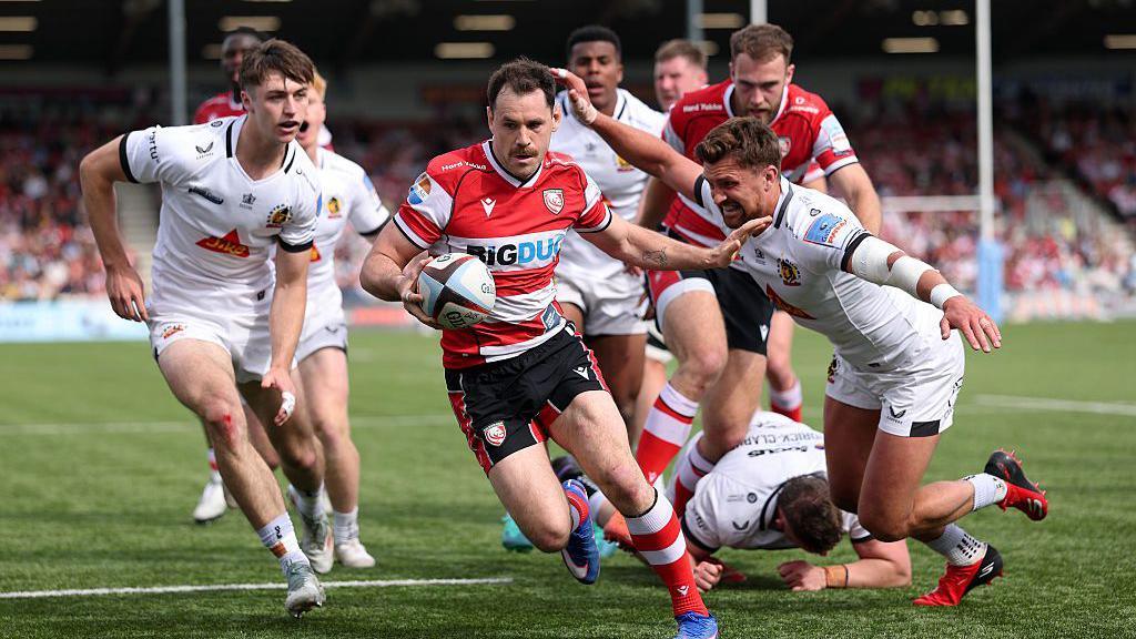 Tomos Williams of Gloucester breaks to score a try during the Gallagher PREM match between Gloucester Rugby and Exeter Chiefs at Kingsholm Stadium.