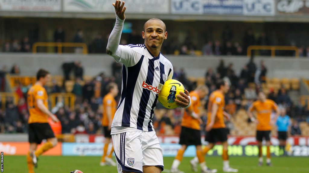 Peter Odemwingie celebrates scoring a Premier League hat-trick for West Brom at Wolves in 2012