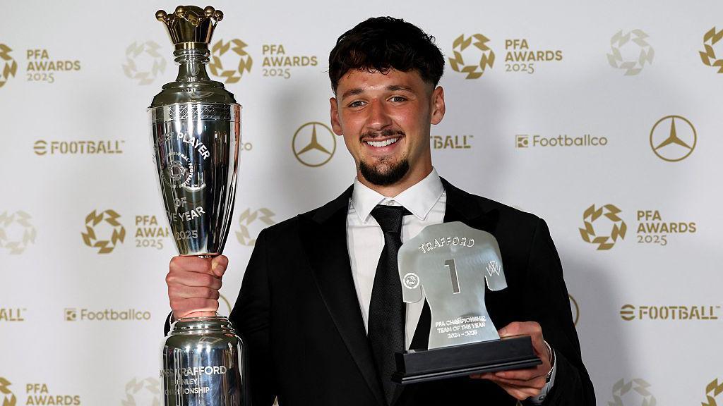 James Trafford with his PFA awards after being named Championship player of the year and selected for the division's team of the year