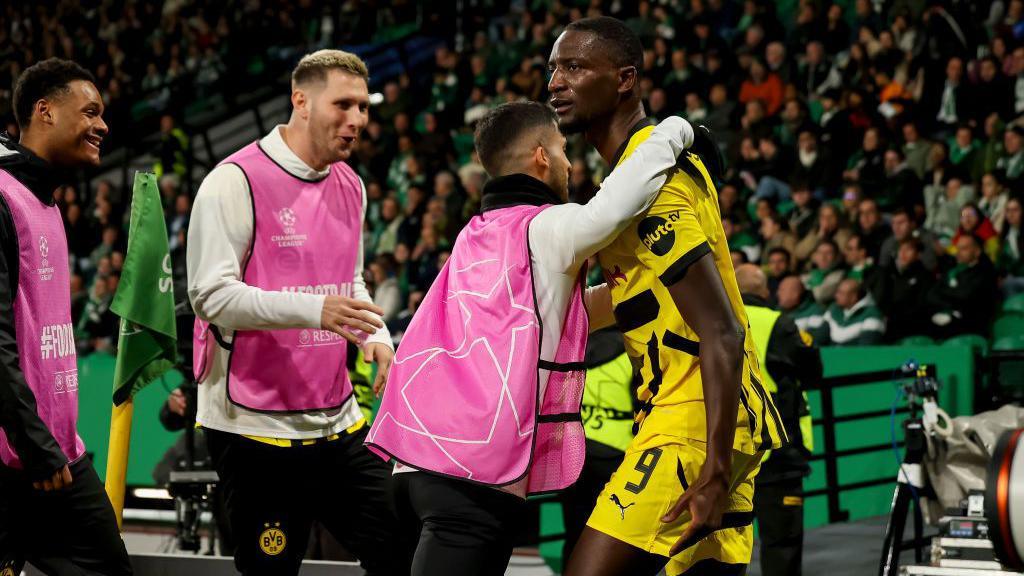 Serhou Guirassy celebrates a goal for Borussia Dortmund against Sporting