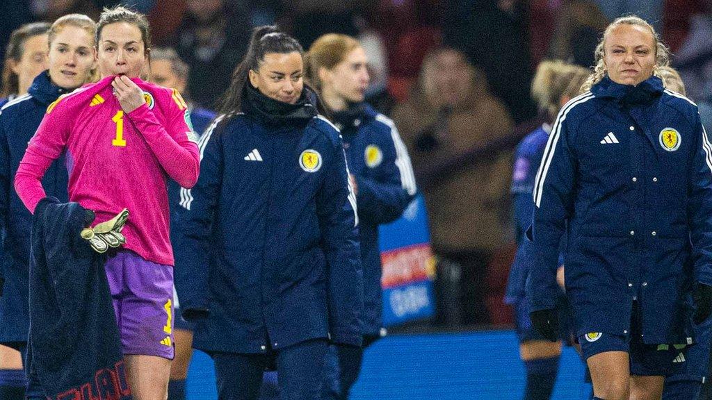 Goalkeeper Lee Gibson and winger Claire Emslie were among the dejected Scotland players following their humbling by near neighbours England