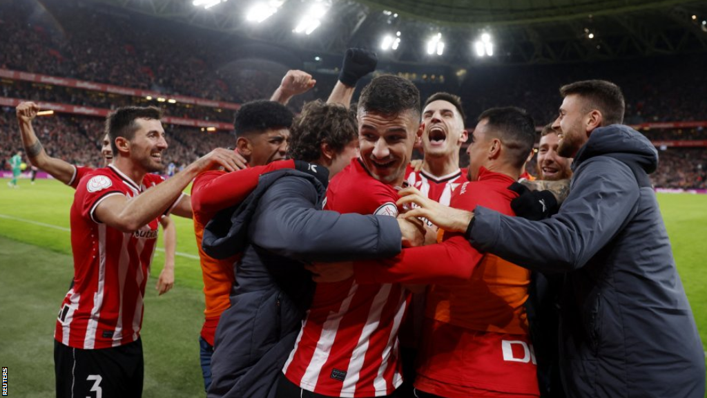 Athletic Bilbao players celebrate scoring a goal