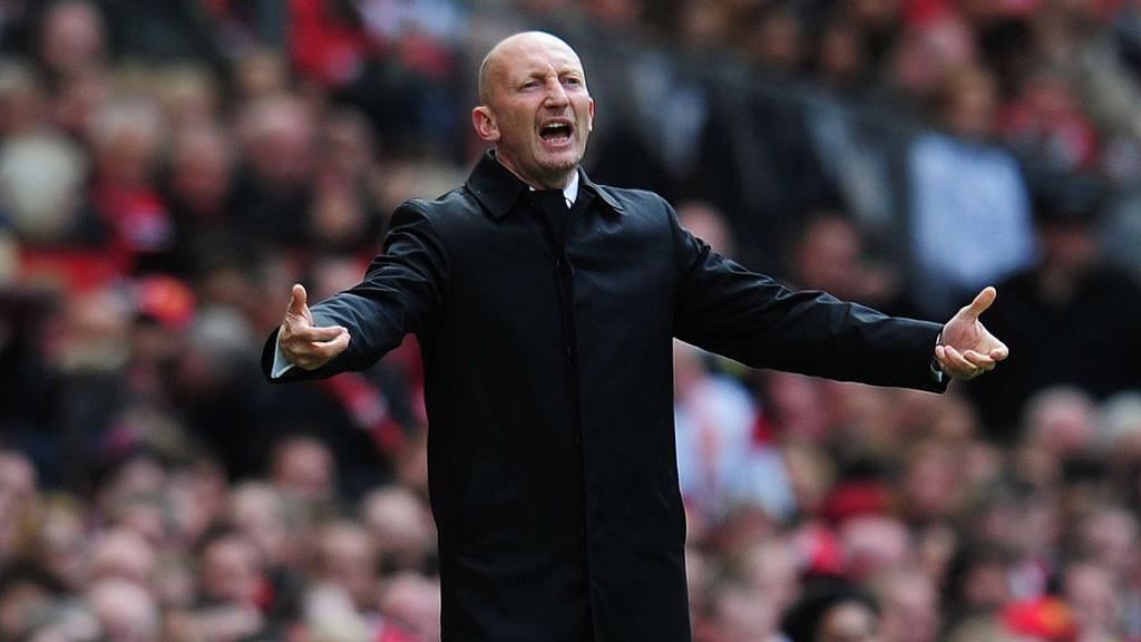 Ian Holloway issues instructions to his players as Blackpool faced Manchester United