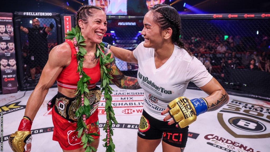 Liz Carmouche and Ilima-Lei Macfarlane embrace following their fight at Bellator 300