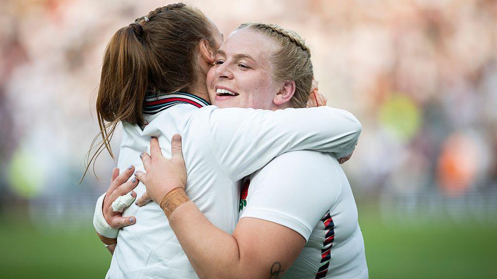 Abi Burton hugging a team mate during the Women's Six Nations. 