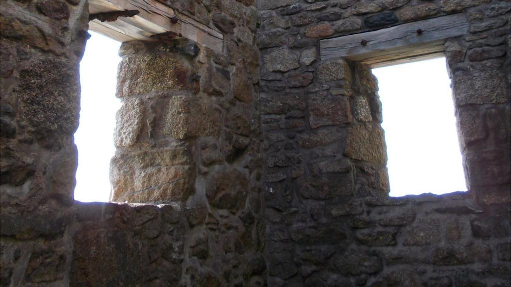 Windows in derelict building