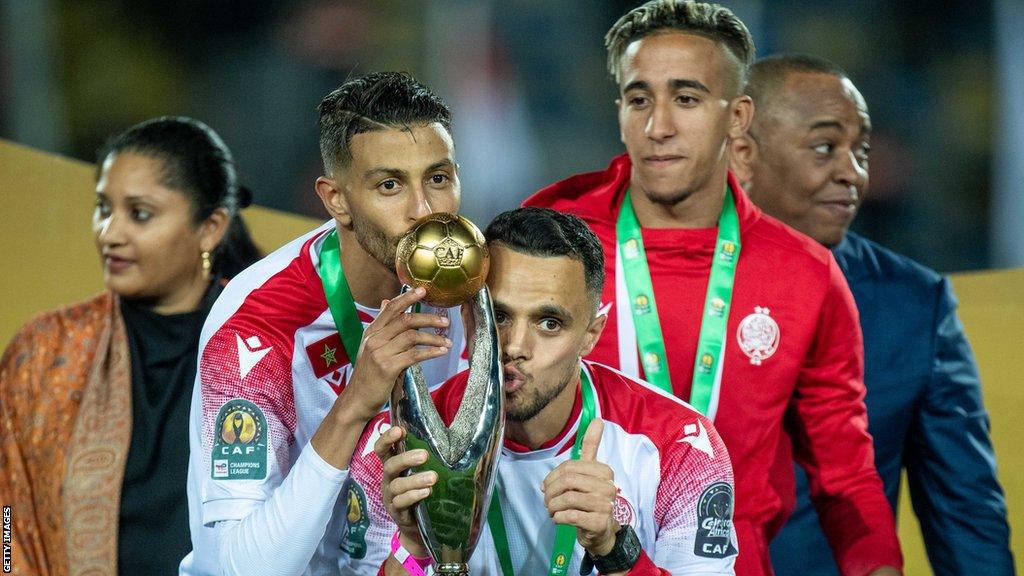 Wydad players with the 2022 Champions League Trophy