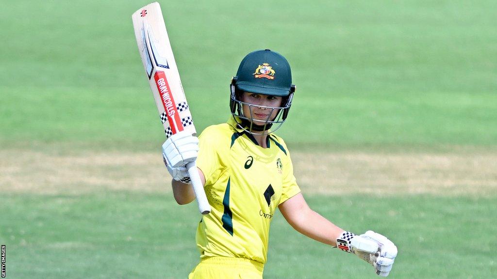 Australia's Phoebe Litchfield celebrates a half-century against Pakistan