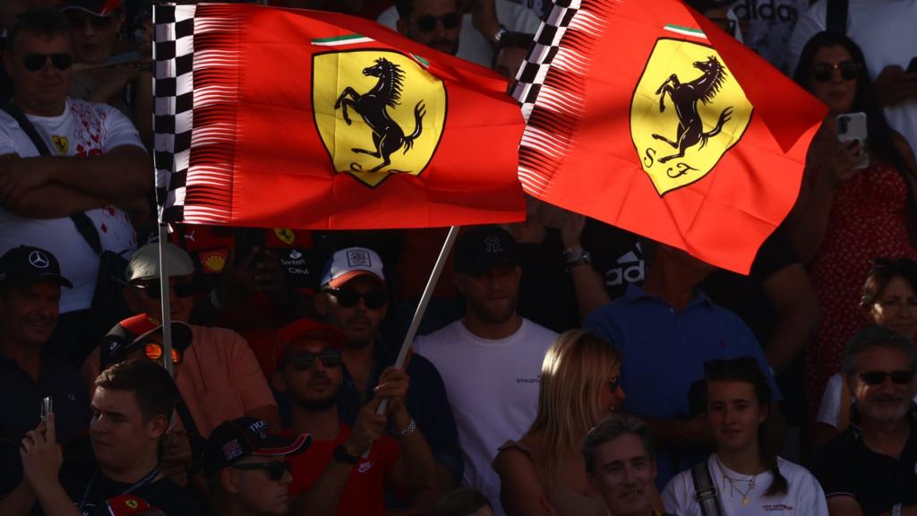 Ferrari flags are flown by the tifosi in the grandstands at Monza