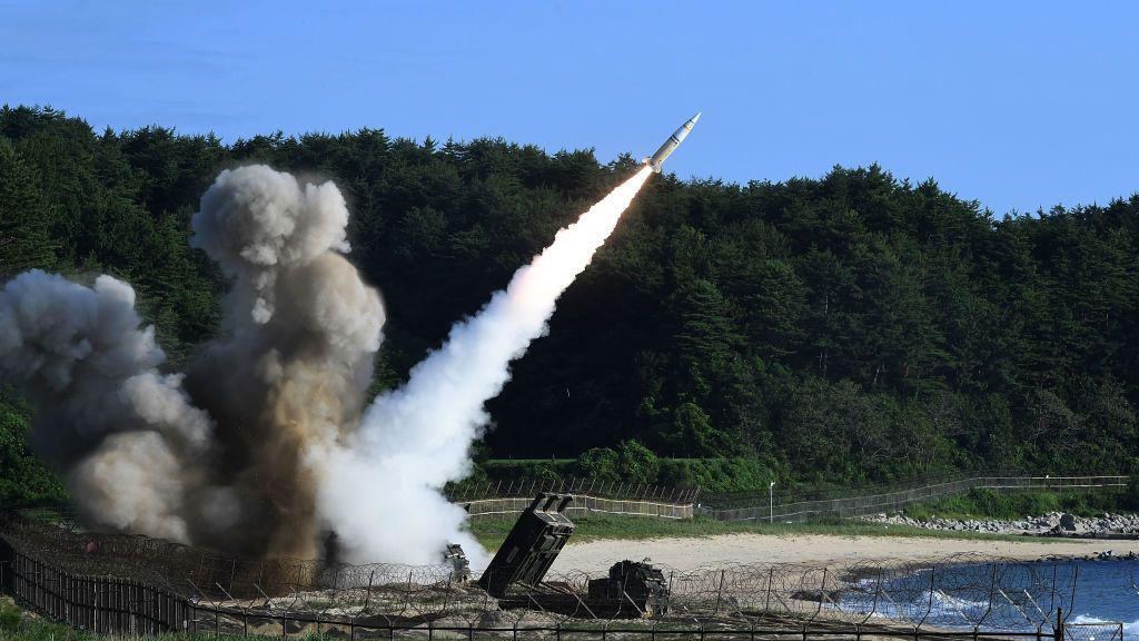 An Army Tactical Missile being launched on a beach.