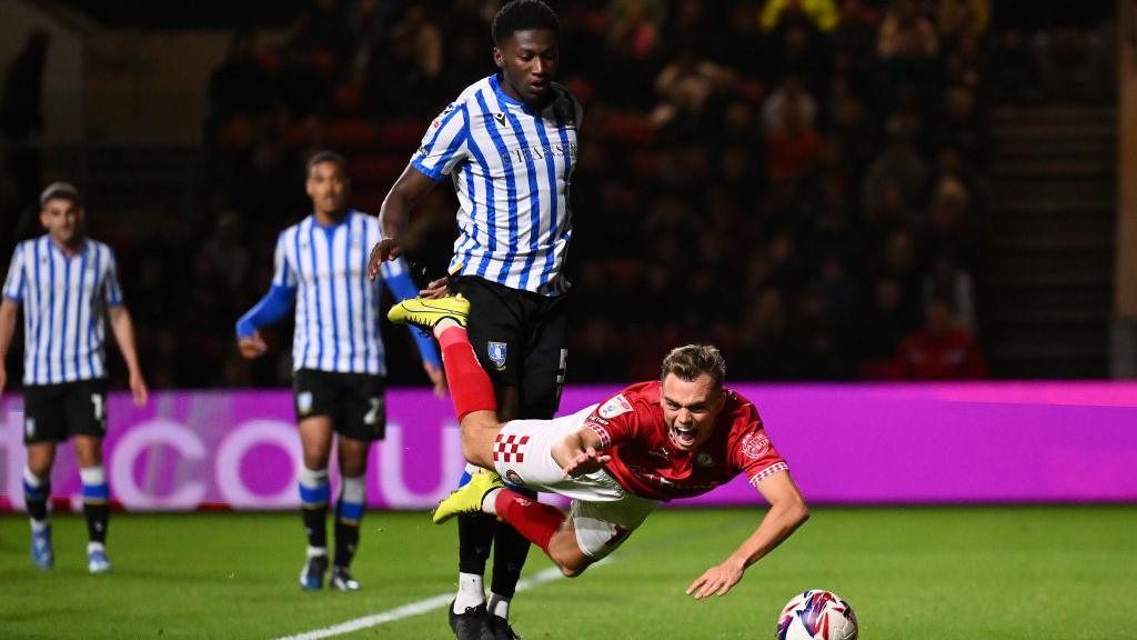 Bristol City and Sheffield Wednesday players vie for the ball