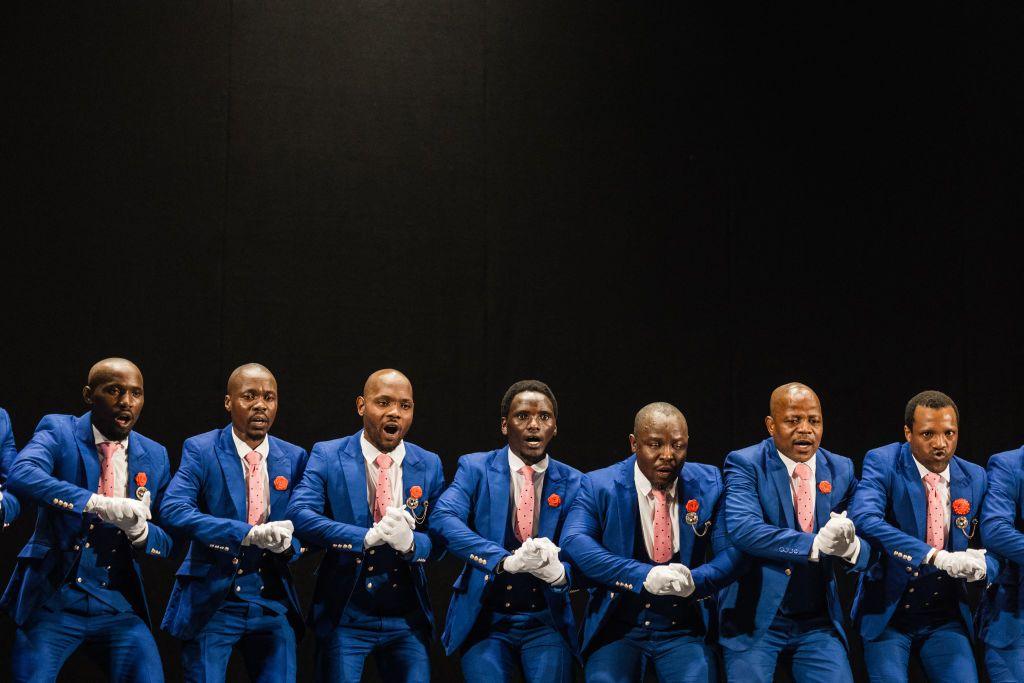 A traditional Isicathamiya group performs a traditional song and dance on stage at the Natal Playhouse Theatre in Durban, on September 21, 2024.