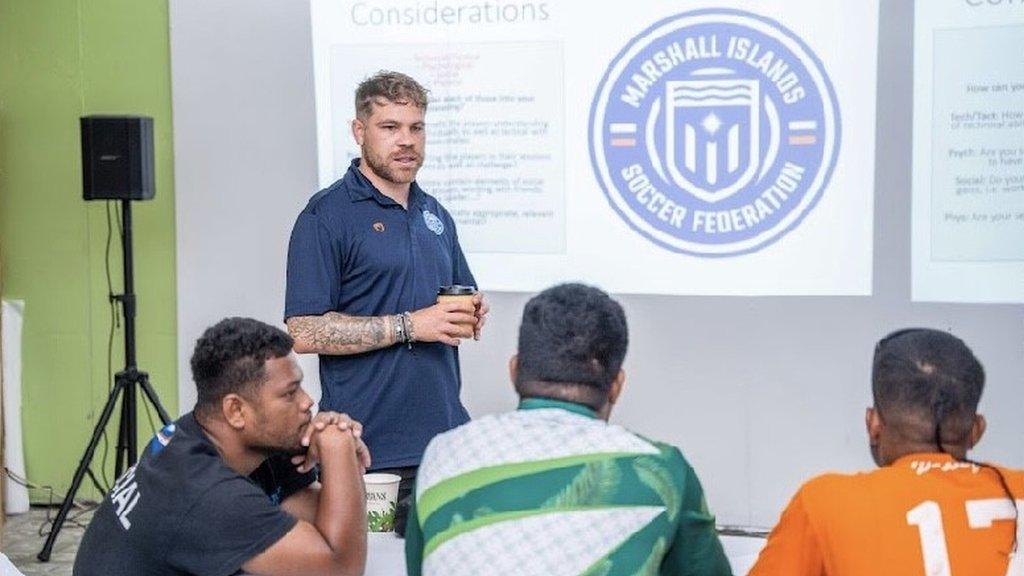 Lloyd Owers leads a presentation on football coaching in the Marshall Islands