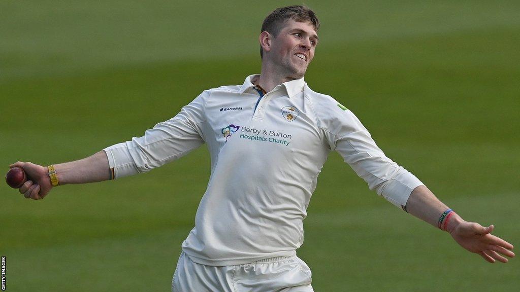 Alex Thomson bowling for Derbyshire