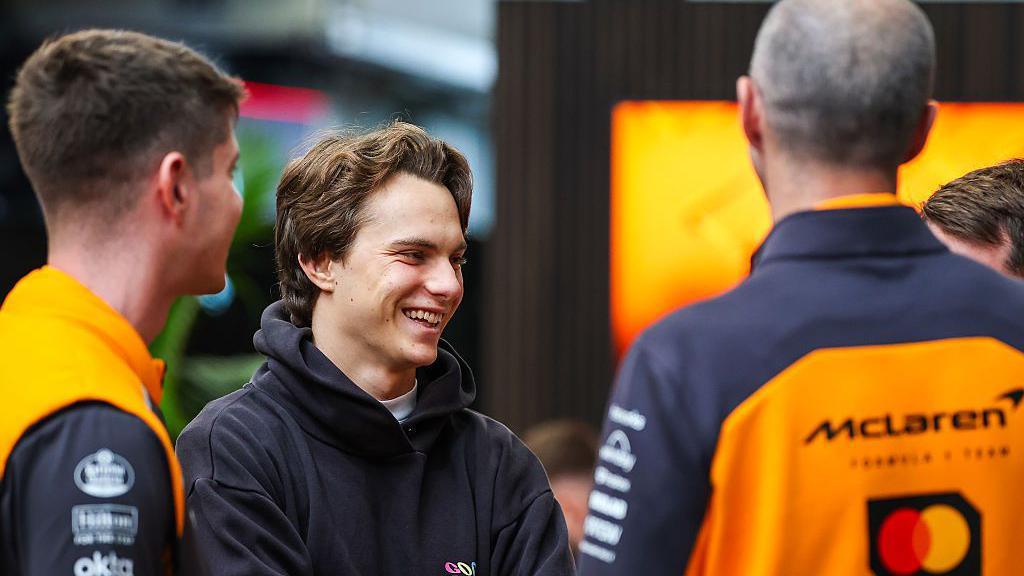 Oscar Piastri chats to his McLaren team in Sao Paulo 