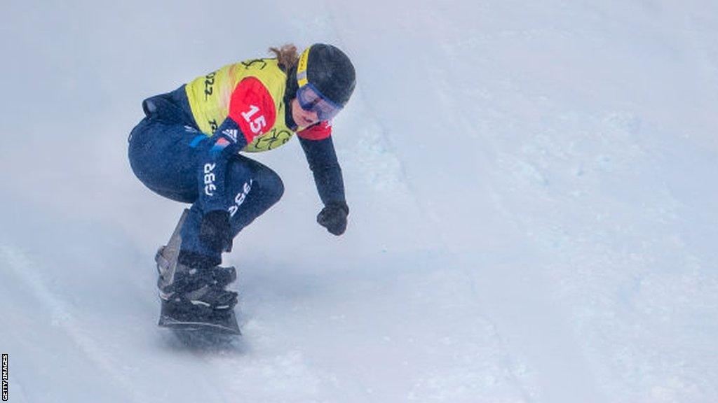 Charlotte Banks of Great Britain in action during the mixed team snowboard cross at Genting Snow , China, during the Winter Olympic Games in February 2022