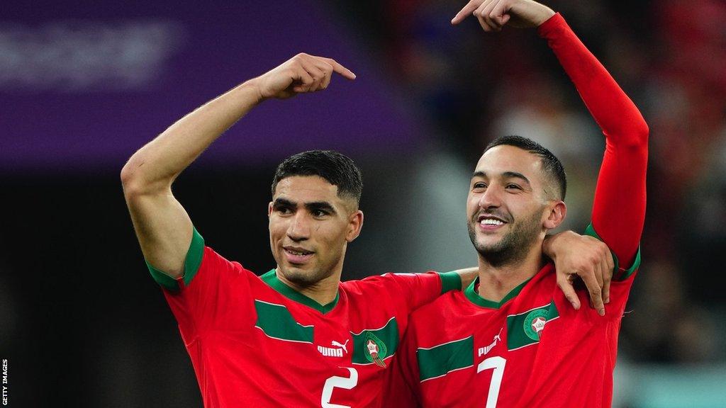 Achraf Hakimi and Hakim Ziyech celebrate a Morocco win at the World Cup