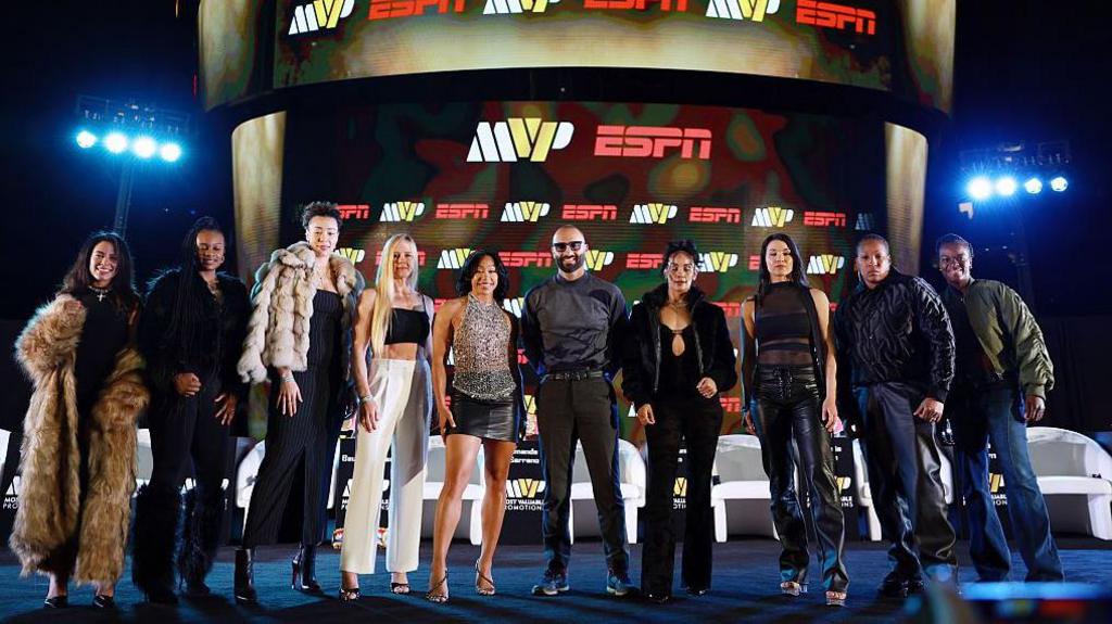 Anna Cruz, Oshae Jones, Tamm Thibeault, Holly Holm, Alycia Baumgardner, Amanda Serrano, Stephanie Han, Shadasia Green and Tiara Brown pose for a photo with co-founder of Most Valuable Promotions, Nakisa Bidarian